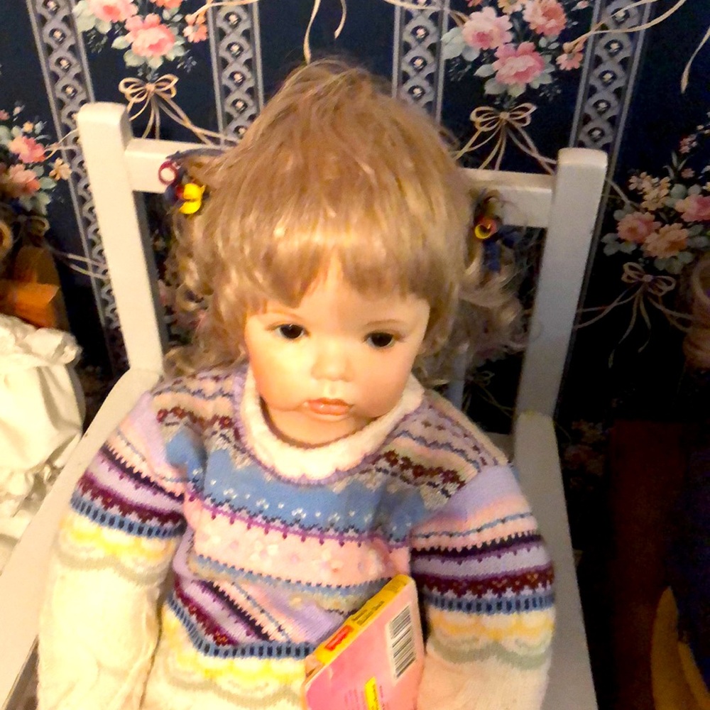 Porcelain lifelike girl doll